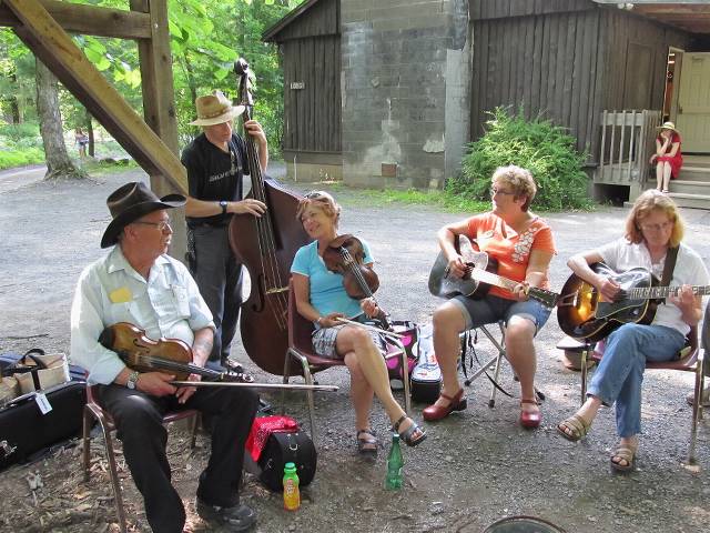 Junior's woodshed.  This is where the action was for us.  That's Junior, Barry, Miriam, Scooter, and Kate (www.mapleleafmusic.com)