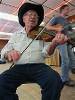 Junior leads the  Western Swing Orchestra